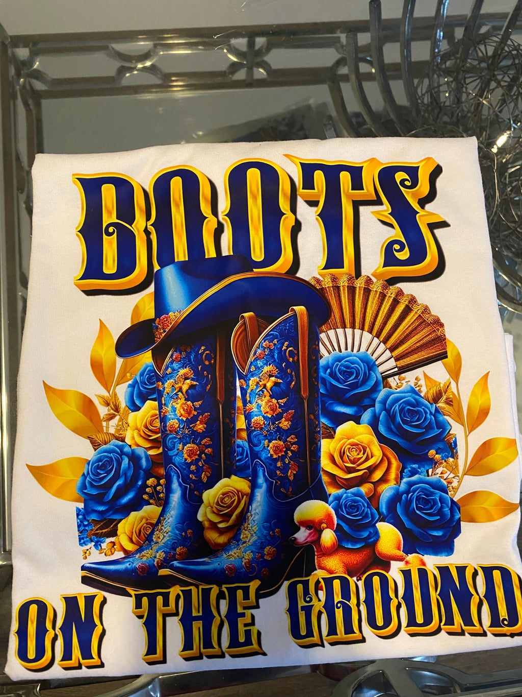 Blue and Gold Boots on the ground poodle