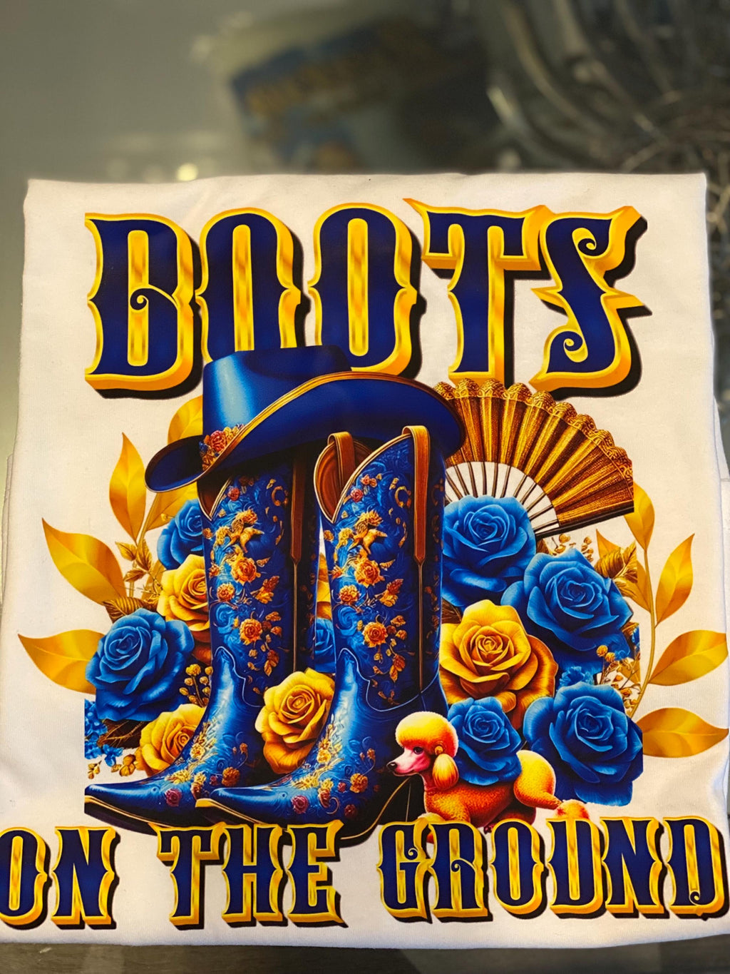 Blue and Gold Boots on the ground poodle
